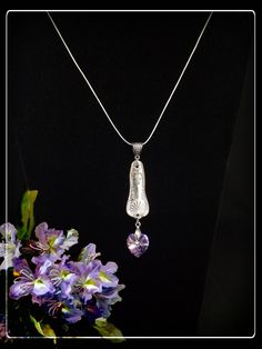 "This pendant is made of an Italian solid silver spoon and a Swarovski   Aurora Borealis heart shaped crystal.  It's color changes between light purple, blue and turquoise.  Stunningly beautiful! The pendant part (connectors +spoon+crystal)  is 9 cm (3,5\") long.   Sterling silver chain is 60cm ( 23,5 \" ) long." Silver Heart Beads Teardrop Jewelry, Silver Teardrop Jewelry With Heart Beads, Vintage Silverware Crafts, Cabochon Pendants, Spoon Pendant, Silverware Crafts, Silverware Jewelry, Vintage Silverware, Silver Spoon