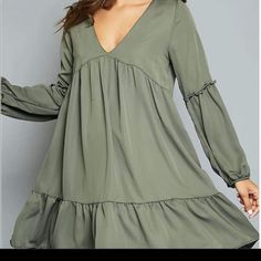 Pair With Boots Or Platform Heels To Transform This Cute Dress From Day To Night. Flowy Ruffled Hem Vneck Baby Doll Dress. Long Puffed Sleeves. Lined. Length: Short Color: Olive Green Fabric Content: 100% Polyester Btq002 Olive Green Fabric, Peach Love, Baby Doll Dress, Long Puff Sleeves, Puffed Sleeves, Cute Dress, Babydoll Dress, Green Fabric, Platform Heels