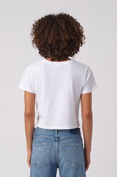 Because you need the perfect boxy, cropped tee to pair with high-waisted jeans. Featuring our signature double needle side seam detail, tonal topstitching, and subtle distressing around edges for a worn-in feel. COLOR: WHITE FIT & MEASUREMENTS: Length = 19 1/2" Cropped, shrunken fit Measurements taken from size Small Talhia is wearing size Small and is 5'10" Fits true to size Fabric & Care: 100% Cotton Machine wash cold, tumble dry low heat Made with love in Los Angeles White Cropped Shirt For Everyday, Boxy Cropped Tops, Casual Cropped Top With Frayed Hem, White Fitted Top With Frayed Hem, Everyday White Cropped Shirt, Fitted White Top With Frayed Hem, Fitted Cropped Tops With Frayed Hem, White Boxy Cropped Top, Fitted Cropped Top With Frayed Hem