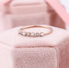 Opal And Akoya Pearl Eternity Ring, Rose Gold Opal Band Rings, Japanese Akoya Pearl Ring, Opal Anniversary Band, Stackable Wedding Rings ✧･ﾟ: *✧･ﾟ:* Welcome to Charles Davin Jewelry*:･ﾟ･ﾟ✧ Moissanite - a gemstone known to bring in luck in someone's life, the user can give off a look of elegance. You can give your special someone luck whilst showing your love to them. ✶Material: 10K/ 14K/ 18K ✶Main Stone: Natural Opal; 1.5mm, Akoya Pearl; 2.0mm ✶Side Stone: - ✶Width of band: 1.2mm ✶Thickness of b Adjustable Rose Gold Pearl Wedding Ring, Adjustable Stackable Opal Ring For Wedding, Delicate Stackable Opal Ring For Wedding, Delicate Adjustable Opal Wedding Ring, Stackable Opal Ring For Wedding, Stackable Round Opal Ring For Wedding, Dainty Stackable Opal Wedding Ring, Dainty Rose Gold Opal Ring For Wedding, Rose Gold Half Eternity Ring As Gift