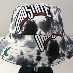 Osu Handmade Hat Bucket Hat Style Perfect For Everything Gray Stretch Denim On 1 Side Ohio State Buckeyes Theme On Other Fully Reversible For 2 Hats In One! Tie Dye Style Design Great For A Game Or Hanging Out Standard Is Roughly 20-21” Around, Xl About 22-23” Around Standard Fits Avg Older Teen, Most Women, Smaller And Average Men Xl Fits The Big Man In Your Life Handmade, Brand New, Boutique. Pricing Is Fair & Firm . Let Us Know If Any Questions Urban Summer Hat With Flat Brim, Urban Flat Brim Summer Hat, Urban Style Flat Brim Summer Hat, Urban Adjustable Hats For Summer, Urban Style Adjustable Hats For Summer, Urban Style Adjustable Summer Hats, Casual White Cotton Bucket Hat, Casual Reversible Hats, One Size, Casual Reversible Brimmed Hat