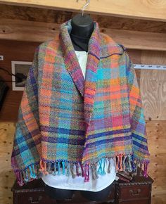 Multi color handwoven wool shawl. Traditional Woven Shawl For Fall, Woven Shawl Scarf For Fall, Handwoven Wool Poncho For Fall, Fall Handwoven Alpaca Shawl, Handwoven Fall Poncho Shawl, Handwoven Fall Shawl Poncho, Wool Handwoven Winter Scarves, Handwoven Wool Scarves For Winter, Winter Wool Handwoven Scarves