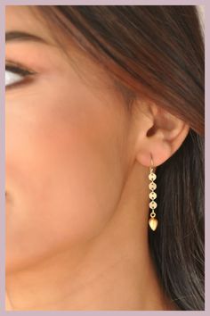 Our very flirty dangle earrings are made of tiny disc or sequin chain. Your choice of a gold dangle or pearl dangle to finish them off. Super light weight and ultra comfy to wear. Our gift to you 10% off your first purchase. Details here - http:/eepurl.com/dpVPBz DETAILS Total earring length including ear wire is 1.5" 14 k gold fill or sterling silver chain and ear wires 24 k gold or sterling silver dangle or freshwater pearl dangle Dainty Dangle Linear Earrings For Party, Gold Plated Linear Earrings For Party, Tassel Drop Earrings For Wedding, Dainty Dangle Threader Earrings For Party, Dainty Drop Earrings For Parties, 14k Gold-filled Earrings With Dangling Charms, Yellow Gold Drop Tassel Earrings, Gold 14k Gold-filled Linear Earrings, Long Drop Teardrop Earrings With Dangling Beads