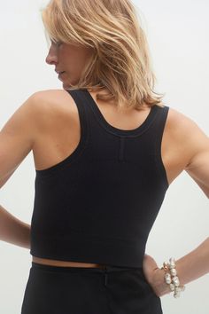 A versatile essential, perfect on its own or layered under your favorite cashmere for easy, stylish comfort. The Brynley cropped tank is a closet must-have. 53% Viscose 45% Nylon 2% Spandex Cropped tank Racerback Rib detailing Corset detailing Jersey knit 13 5/8" length (size small) Dry Clean Only All sale items are FINAL SALE. Everyday Bra Friendly Cropped Tops, Seamless Cropped Tank Top, Bra-friendly Everyday Crop Top, Everyday Seamless Spring Crop Top, Basic Everyday Seamless Crop Top, Versatile Everyday Crop Top, Everyday Cropped Seamless Crop Top, Everyday Seamless Cropped Top, Seamless Construction Crop Top