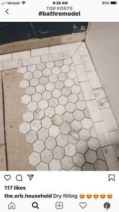 the bathroom floor is being remodeled with white tiles