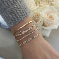 The Diamond Script Name Curb Chain Bracelet sparkles with your choice of 1-10 diamond script letters, set on a 14k gold curb chain. Designed to stack or wear solo, this one-of-a-kind custom style is true arm candy. Personalized Bracelet For Her, Gift Diamond Bracelet With Curb Chain, Elegant Formal Name Bracelet With Curb Chain, Elegant Gold Diamond Name Bracelet, Elegant Diamond Curb Chain Bracelet, Gold Name Bracelet With Diamond Accents For Gift, Name Bracelet Gold, Gold Name Bracelet, Personalized Bracelets For Her