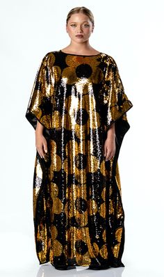 You don't have to wait until spring to bloom, you can get the Any Old Iron Golden Quantastic Quaftan and bloom all year round! This golden kaftan of happiness has a v-neckline and is decked out in a golden floral pattern from the neckline to the hem. The stunning gold sequins flip to black and the black sequins flip to the vibrant gold. It is perfect for any vacation, event, and performance! The light weight material is super breathable and soft on the skin. This Quantastic Qaftan is literally t Kate Bosworth, Gold Sequins, To Wait, Cardi B, Elton John, Black Sequins, Lady Gaga, One Size Fits All, The Black