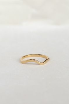 An asymmetric contour, perfect for any stack. This ring is endlessly versatile. Stack it, flip it, twist it. Wear it everyday. Select from solid yellow, white or rose gold and either high polish or matte finish. - 14k recycled gold - 1.5mm band This ring is handmade to order. Please allow up to 2 weeks to make and ship. Contour Ring, Cleaning Stone, Jewelry Wishlist, Love Mail, Basic Photo Editing, Pearl Birthstone, Hanging Necklaces, Minimal Ring, August Wedding