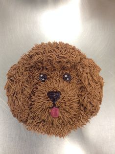 a cake made to look like a dog's head