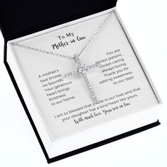 Sharing your faith has never been easier than with this gorgeous gift. The CZ Cross necklace is the perfect present for baptisms, birthdays, and every celebration in between. This stunning piece is white gold dipped, crafted with high-grade CZ crystals, and finishes in a sturdy lobster clasp. Your special someone will be delighted when you add this meaningful element into their wardrobe. This piece is lovingly packaged in either a soft touch box or mahogany style luxury box for easy gifting. Pro Mother's Day Wedding Necklace With Gift Box, Spiritual Cross Pendant Necklace For Gift, Spiritual Cross Pendant Necklaces For Gift, Wedding Jewelry Gift For Father's Day, Mother's Day Gift Cross Pendant Necklace, Father's Day Necklace With Gift Box, Personalized Cross Pendant Jewelry For Gifts, Spiritual Jewelry As Mother's Day Gift, Personalized Cross Pendant Jewelry Gift