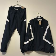 Zip Up Jacket & Pants Set Black & White Black Outdoor Sportswear Tracksuit, Casual Black Tracksuit For Outdoor, Black Tracksuit With Pockets For Streetwear, Black Long Sleeve Tracksuit For Outdoor, Nike Black Tracksuit Sportswear, Nike Black Tracksuit For Streetwear, Black White Nike, Mens Slip On Shoes, Nike Windbreaker