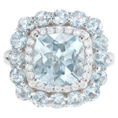 This collection features an array of aquamarines with an icy blue hue that is as cool as it gets! Accented with diamonds these rings are made in white gold and present a classic yet elegant look. Classic aquamarine ring in 18K white gold with diamonds. Aquamarine: 2.56 carat cushion shape, 9X9mm. Aquamarine: 1.72 carat round shape, 3X3mm. Diamonds: 0.28 carat, G colour, VS clarity. Gold: 5.178g, 18K white gold. Ring Size: US 6.75 - Size can be adjusted for free upon request - please reconfirm wi 5 Carat Ring, Contemporary Engagement Rings, Morganite Ring, Naha, Icy Blue, Modern Ring, Aquamarine Rings, Diamond Stone, Bridal Rings