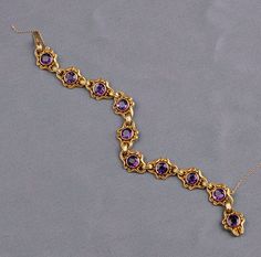 Art Nouveau 14kt Gold and Amethyst Bracelet, Sloan & Co., bezel-set with ten circular-cut amethysts in scrolling frames, 9.9 dwt, lg. 7 in., maker's mark. Period Jewelry, Delicate Gold Jewelry, Indian Wedding Jewelry Sets, Gold Bridal Necklace, Gold Jewelry Outfits, Set Saree, Ladies Bracelet, Beautiful Gold Necklaces, Gold Chain Design