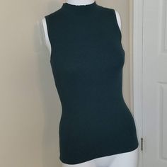 This Size Small Hunter Green Sleeveless Mock Turtleneck Is New With Tags. Blue Stretch High Neck Tank Top, Blue High Neck Stretch Tank Top, Blue Fitted High Neck Tank Top, Fitted High Neck Blue Tank Top, Casual Sleeveless Mock Neck Top For Spring, Solid Sleeveless Stretch Mock Neck Top, Spring Sleeveless Mock Neck Top, Casual Sleeveless Mock Neck Top For Layering, Green Ribbed High Neck Top