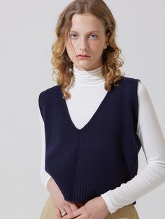 Composition : Wool 100%Color : NavyCountry of Origin : Republic of Korea Blue Knit V-neck Vest, V-neck Knit Vest For Work, Blue V-neck Sweater Vest For Fall, Blue V-neck Fine Knit Sweater, Fall Navy V-neck Tops, Elegant Blue V-neck Vest, Blue V-neck Sweater For Layering, Blue Cashmere V-neck Sweater, Blue V-neck Cashmere Sweater