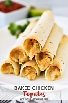 baked chicken taquitass on a plate with salsa in the background and text overlay