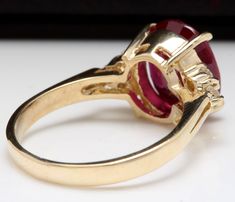 6.50 Carats Impressive Red Ruby and Diamond 14K Yellow Gold Ring Suggested Replacement Value $5,300.00 Total Red Ruby Weight is: 6.25 Carats Ruby Measures: 11x 9mm (Lead Glass Filled) Natural Round Diamonds Weight: .25 Carats (color G-H / Clarity SI1-SI2) Ring total weight: 5.2 grams Disclaimer: all weights, measurements and colors are approximate and may vary slightly from the listed dimensions or as seen in the image. All pictures are magnified to show the smallest of details. Please, refer to Formal Red Diamond Ring With Polished Finish, Formal Red Ruby Ring With Polished Finish, Formal Polished Red Ruby Ring, Fine Jewelry Red Diamond Ring Stamped 14k, Formal Rings With Prong Setting For Valentine's Day, Valentine's Day Formal Ruby Ring With Brilliant Cut, Formal Ruby Ring With Prong Setting For Valentine's Day, Classic Round Ruby Ring For Valentine's Day, Classic Red Diamond Ring With Polished Finish