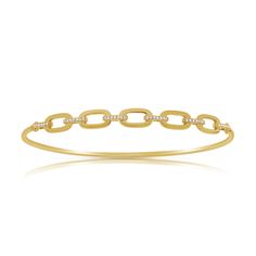 Enhance your elegance with the 14K Gold Designer Links Diamond Bangle. This exquisite piece is crafted from luxurious 14K gold and features a unique design of interlocking links. Each link is adorned with sparkling diamonds, totaling 0.14 carats, adding a touch of brilliance and sophistication to the bracelet. The intricate design and radiant diamonds make this bangle a standout accessory for both everyday wear and special occasions. With a secure clasp and a comfortable fit, this diamond bangle Elegant Diamond Link Bracelet, Yellow Gold Diamond Bracelet With Rectangular Links, Yellow Gold Diamond Bracelets With Rectangular Links, Diamond Chain Bangle Bracelet With Single Cut Diamonds, Diamond Link Gold Bracelet Fine Jewelry, Fine Jewelry Diamond Link Gold Bracelet, Fine Jewelry Gold Diamond Link Bracelet, Elegant Diamond Link Gold Bracelet, Elegant Diamond Link Bracelet With Solid Construction