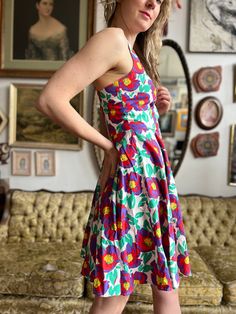 Description: Expertly designed with a vintage-inspired fit and flare silhouette, this 80s era dress boasts a unique and eye-catching floral pattern. Made with quality materials, this dress is sure to make a statement at any event. Available in size M. Size: M Bust: 32” Waist: 27” Condition: excellent Label: Allison Blair Material: 100% Cotton Era: 80s does 50s This is a preloved item. Retro Summer Dresses For Retro-themed Events, Spring Vintage Dress For Retro-themed Events, Summer Retro Dresses For Retro-themed Events, Retro A-line Vintage Dress For Garden Party, Vintage Dress For Retro-themed Spring Events, Summer Retro Vintage Dress For Retro-themed Events, Summer Party Dress With Vintage Print, Summer Vintage Dress For Retro Events, Fitted Vintage Dress For Retro-themed Summer Events