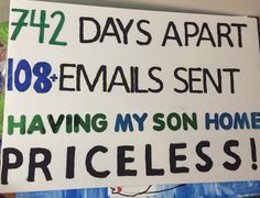 a sign that says, 472 days apart 108 emails sent having my son home priceless