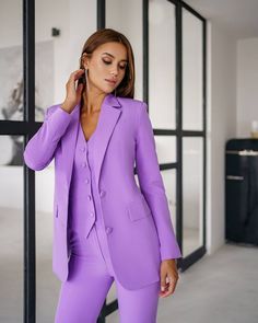 Three-piece pantsuit for women: straight leg pants with high rise, buttoned vest and lined blazer Please note suit measurements  Pants length inseam is 36 inches or 91 cm Sleeve length 24 inches or 61 cm Our Women's Blazer Trouser Suit for office, business meetings, formal events and special occasions. Always trendy, classic and o good looking DETAILS -  straight leg pants -  high rise -  blazer is buttoned -  lined -  side pockets -  relaxed fit -  single breasted -  buttoned vest MATERIAL Premium quality suiting fabric, consists of viscose, elastane and polyester  SIZES The model in photos is wearing a size S Available in 4 sizes: 2 US numeric  BUST 32-34 inches or 82-86 cm WAIST 23-24.8 inches or 59-63 cm HIPS 33-35 inches or 86-90 cm 4 US numeric  BUST 34-35 inches or 86-90 cm WAIST 25 Tailored Pantsuit With Buttons, Solid Suits With Buttons For Office, Spring Business Pantsuit With Buttons, Office Pantsuit With Notch Lapel And Buttons, Spring Office Three-piece Suit With Notch Lapel, Office Pantsuit With Button Closure And Suit Collar, Spring Three-piece Suit For Workwear, Spring Workwear Three-piece Single Breasted Suit, Purple Suits For Office