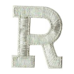 the letter p is made out of yarn and has been stitched together with thread