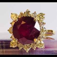 Exclusive authentication service & customer support. Free 1-3 day shipping for a limited time. Description: Condition Is New - 8.89 Carat Round Ruby Ring With 16 Round Diamonds.Weighing 1.48 carats. Sold by waterlily1116. Fast delivery, full service customer support. Yellow Gold Ring, Ruby Ring, Yellow Gold Rings, Womens Jewelry Rings, Red Gold, Chocolates, Gold Ring, Round Diamonds, Limited Time