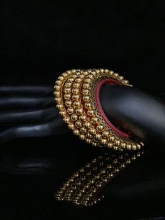 2.2 is smallest size / 2.6 Is medium size / 2.8 is large size / 2.10 is largest size Antique Gold bangle Pair/ Royal Kangan/ Antique Gold Polish Kada Packed in a nice box with cotton lining, Best for gifting to loved ones.. A personal note for your loved ones can be added. *Since this is 100% Handmade jewelry. So Color, shades, texture displayed may slightly vary from the actual product due to digital image limitations. We request you to consider these minor variations. Please expect the possibi Gold Beaded Bangle Jewelry, Gold Beaded Bangle For Wedding, Traditional Stackable Metal Jewelry, Temple Jewelry Metal Bracelets, Traditional Stackable Metal Bangle, Adjustable Temple Jewelry Bangle For Celebrations, Metal Temple Jewelry Bracelets, Traditional Metal Stackable Bangle, Ceremonial Round Metal Bangle