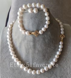 Jewelry: fresh water pear, genuine cultured pearl Color: white Grade: A have natural blemish and growth rings as photos Size: 9-9.5mm; off round Length: necklace offer different length. Bracelet about 7.5-8 inch! Handwork: knotted between every 2 pearl bead Metal: alloy Shipping: I will send out your order in 1-5 business days. Usually will take about 25-50 business days. As seller, I really hope you will receive your parcel the earlier the better. Best regards! Classic Round Pearl Necklace For Mother's Day, Mother's Day Round Pearl Necklace, Classic White Pearl Bracelet For Mother's Day, Mother's Day Pearl White Jewelry With Pearl Drop, Mother's Day Pearl White Pearl Drop Jewelry, Elegant Round Beads Pearl Bracelet For Mother's Day, Pearl White Akoya Pearl Round Jewelry, Classic Pearl Drop Jewelry For Mother's Day, Classic Jewelry Sets With Round Beads As A Gift