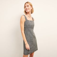 The Jennifer has the vibe of a little summer dress—but actually offers a generous amount of coverage. The straight silhouette skims the body without being tight, the hemline hits just above the knee, and wide straps conceal your bra straps. Thanks to our Japanese cotton tweed fabric, it also maintains its structure throughout the day.  Made in Vietnam with fabric from Japan. Summer A-line Tweed Dress For Work, Chic Summer A-line Tweed Dress, Classic Lined Mini Dress For Summer, Fitted Sleeveless Tweed Summer Dress, Spring Fitted Mini Length Tweed Dress, Fitted Linen Midi Dress With Straight Neckline, Chic Fitted Mini Length Tweed Dress, Fitted Knee-length Linen Mini Dress, Fitted Linen Mini Dress For Work