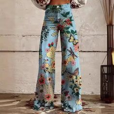 Conquer any challenge with our Skinny colorful flowered Loose Pant. These stylish pants feature a high waist design for a flattering silhouette and a loose fit that allows for effortless movement. Perfect for the risk-taking and adventurous spirit, these pants are a must-have for any fashion-forward individual. Casual Colorful Wide Leg Bottoms, Multicolor Baggy High Waist Pants, Trendy Colorful Pants For Spring, Trendy Colorful Bottoms For Spring, Trendy Colorful Spring Pants, Trendy Colorful Spring Bottoms, Multicolor Wide Leg Pants With Floral Print, Baggy High Waist Multicolor Bottoms, High-waisted Colorful Bottoms For Spring