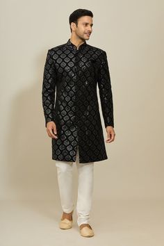 Black sherwani with all over Mughal ogee pattern, thread and sequin embroidery. Paired with a white churidar. - Aza Fashions Eid Party Bandhgala Straight Kurta, Festive Bandhgala With Resham Embroidery For Eid, Wedding Nehru Jacket With Mirror Work, Party Embroidered Straight Kurta Bandhgala, Fitted Bandhgala With Chikankari Embroidery For Festive Occasions, Festive Fitted Bandhgala With Chikankari Embroidery, Embroidered Bandhgala For Party, Party Bandhgala With Embroidery, Designer Mirror Work Sherwani Straight Kurta