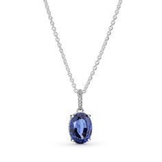 Add drama to your look with the Sparkling Statement Halo Pendant Necklace. Hand-finished in sterling silver and featuring a statement halo pendant set with a blue man-made crystal, this is a subtle design and delicate form with unique detailing. The chain necklace is adjustable to three different lengths, so that you can create the perfect styling to match your look. It will serve as a staple in your collection for years to come. Halo Pendant, Cz Pendant, Pandora Jewelry, Pendant Set, Blue Crystals, Blue Man, Jewelry Shop, Halo, Chain Necklace