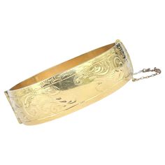 This gorgeous 9 carat rolled gold bangle has wonderful engraving. Inner diameter widest point: 6cm Inner circumference: 17.5cm Bangle Width: 19mm Weight: 50.5g Luxury Vintage Engraved Cuff Bracelet, Engraved Bangle, Gold Engraving, Gold Bangle, Gold Bangles, Bangle Bracelets, Jewelry Bracelets, Bangles, Bracelet