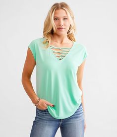 Women's Strappy Double V-Neck Top In Green By Daytrip., Women's Mint Modal blend top Bust measures 36 on size small Body length 25 on size small. 65% Modal 35% Polyester. Machine wash cold gentle cycle with like colors. Do not bleach. Tumble dry low. Cool iron.. Measurements: Bust -Fullest part of bust with arms at sides. Waist -Circumference of natural waist: above belly button below rib cage. Hips -Standing with feet together fullest part of hips. WOMEN'S TOP SIZE CONVERSION CHART Size US/CAN Woman Neck, Waist Circumference, Conversion Chart, Rib Cage, Women Shirts Blouse, Shirts Blouses, Women's Shirts, Belly Button, V Neck Tops