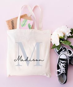 This 100% cotton bag comes in one size - 15" x 16"- perfect for everyday wear. The canvas material is durable and will last for years. The bag is easy to carry even with a week's worth of shopping. I can write everything you want on the tote bag.  ♥ PRODUCTION TIME: 1-5 days (Usually 2-3 days) ♥ SHIPPING TIME: 2-5 days (Usually 3 days) ♥ PRODUCT DESCRIPTION: - 100% cotton canvas - Available in natural and black colors - Heavy fabric  - Sewn-in label ♥ CARE INSTRUCTION: Do not iron directly over Personalized White Canvas Shopping Bag, Personalized Cotton Canvas Bag For School, Personalized Rectangular Cotton Bags, Personalized Cotton Canvas School Bag, Personalized Cotton Bags For Daily Use, Customizable Cotton Canvas Shopping Bag, Customizable Cotton Canvas Bag For Everyday Use, Personalized Cotton Bags For Gifts, Personalized Cotton Bags For Gift