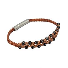 Embrace Bold Elegance with our Onyx Leather Bracelet, a perfect blend of natural strength and sleek style. This handcrafted bracelet features smooth, polished onyx beads set against a durable leather cord, creating a striking contrast that’s both modern and timeless. The deep black onyx exudes a sense of mystery and confidence, while the leather adds a rugged, natural touch. Ideal for everyday wear or as a standout accessory for special occasions, this bracelet offers versatility and effortless Modern Adjustable Black Beaded Jewelry, Adjustable Brown Hematite Beaded Bracelets, Adjustable Hematite Brown Bracelets, Adjustable Brown Hematite Bracelet, Modern Adjustable Onyx Beaded Bracelets, Elegant Adjustable Braided Leather Bracelet, Elegant Adjustable Leather Braided Bracelet, Modern Adjustable Onyx Bracelet, Elegant Black Beaded Leather Bracelet