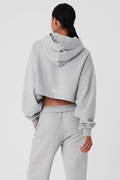 A cute and comfy counterpart to your high-waisted favorites, the Bae Hoodie has a relaxed fit, long scrunchable sleeves, ribbed cuffs and a slightly cropped ribbed hem that highlights the natural waist. The pocketless design is streamlined and bulk-free, and the French terry is an absolute pleasure to pull on: smooth on outside and fleecy on the inside. Ribbed Hooded Hoodie For Loungewear, Hooded Ribbed Tops For Loungewear, Ribbed Hoodie For Loungewear, Ribbed Hooded Top For Loungewear, Stretch Ribbed Hooded Top, Cozy Fit Hoodie With Ribbed Waistband For Loungewear, Sporty Ribbed Sweatshirt For Loungewear, Casual Stretch Ribbed Hoodie, Winter Ribbed Hoodie For Loungewear