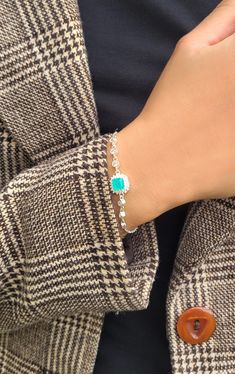 Original Paraiba turmalin bracelet with zircons, 925 Sterling Silver delicate ottoman jewelry, turquoise stone chain bracelet. * Sterling silver 925, Turmalin paraiba, zircons. * Bracelet length: 15,5 + 4 cm. * Main element dimensions: 10 x 10 mm. * Zircons' dimensions: 5 mm. * Original Turkish product. Handmade. * NICKEL FREE. * IN OUR STORE YOU CAN ALSO FIND A PENDANT, EARRINGS and RING with turmalin. ALL OUR PRODUCTS ARE PACKED IN AN ELEGANT JEWELLERY BOX WITH OUR LOGO. They are perfect for a Turquoise Cubic Zirconia Jewelry Gift, Silver Emerald Bracelet Fine Jewelry, Silver Emerald Bracelets In Fine Jewelry Style, White Gold Bracelet With Gemstone Accents For Gift, Gemstone Accented Fine Jewelry Tennis Bracelet, Sterling Silver Diamond Gemstone Bracelet As A Gift, Cubic Zirconia Bracelets With Gemstone Accents Gift, Silver Emerald Bracelets, Silver Emerald Gemstone Bracelets