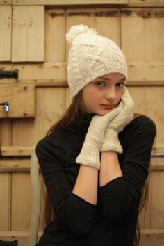 A delightfully soft beanie, hand knitted in the finest quality pure alpaca wool.  This style is great for snow sports and for keeping cosy and cute through winter!  Alpaca is four times warmer than lambswool and it doesn't pill (bobble), so you will find this hat looks good for ages. You won't need to wash it often as the properties of the natural fibre repel dirt.  When you do wash it, hand wash in warmish water with delicate detergent or shampoo and it will wash brilliantly and stay like new. Knit Toque, Pink Beret, Beanie With Pom Pom, Slouch Beanie Hats, Beanie With Pom, Wooly Hats, Dress Up Jeans, Pom Pom Beanie Hat, Bobble Hat