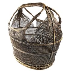 an old woven basket on a white background