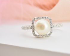 * Stunning handmade solid gold pearl ring. Adorned with tiny beads of white zircon gemstone to emphasize the unique design. This ring is designed to look elegant from all sides of your finger. You will not be able to take your eyes off the fascinating color of opal stone and the magnificent glitter of solid gold. 14K and 18K options are avaliable. It is suitable for daily use * ★Item Details ♥Made to Order ♥Gold Kt: 14K & 18K ♥Available Gold Color: Gold, Rose Gold, White Gold ♥Pearl Stone Si Wedding Pearl Drop Ring With Diamond, Diamond Pearl Ring With Halo For Gift, Anniversary Pearl Ring With Halo Setting And Cubic Zirconia, Anniversary Pearl Ring With Halo Setting, Wedding Pearl Drop Diamond Ring, Pearl Rings With Diamond Accents For Gift, Fine Jewelry Pearl Ring With Cubic Zirconia Center Stone, Wedding Diamond Rings With Pearl Drop, Brilliant Cut Akoya Pearl Rings For Gift