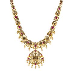 Designed with the elegance traditional Indian jewelry is known for, this 22k antique gold necklace by Virani Jewelers features rubies and cubic zirconia stones.The antique 22k gold finish offers a sophisticated, vintage look, while the gemstones add a vibrant contrast. Ideal for formal events and celebrations, this stunning gold necklace is a beautiful representation of traditional craftsmanship, blending heritage and contemporary style for those who appreciate luxurious, meaningful jewelry.Features• 22k yellow gold• Antique finish• Engraved details• Cubic zirconia• Ruby Specifications:• Minimum Width - 2.3 millimeters• Maximum Width - 50.5 millimeters• Length - 26 inches• Weight - 84 grams Luxury Elegant Kundan Necklace With Cubic Zirconia, Gold Necklace Indian Bridal Jewelry Totaram Jewelers, Luxury Kundan Jewelry With Gemstones, Luxury Kundan Necklace In Temple Jewelry Style, Luxury Kundan Necklace With Cubic Zirconia And Elegant Design, Traditional Luxury Engraved Necklaces, Luxury Elegant Necklace With Antique Finish, Luxury 22k Gold Engraved Necklaces, Luxury Antique Necklaces For Celebration