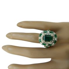 Stamped: 14K Total Ring Weight: 11.8 Grams Emerald Weight 3.20 Carat (9.00x7.00 Millimeters)Side Emerald Weight 2.00 CaratDiamond Weight: 1.70 carat (F-G Color, VS2-SI1 Clarity )Face Measures: 20.70x17.75 Millimeter SKU: [600419] Luxury Emerald Ring With Accent Stones For Formal Occasions, Luxury Green Cluster Ring For Formal Occasions, Luxury Green Cluster Ring For Formal Events, Green Cluster Luxury Ring, Formal Cluster Brilliant Cut Emerald Ring, Formal Cluster Emerald Ring With Center Stone, Formal Cluster Emerald Ring With Prong Setting, Luxury Green Diamond Ring For Formal Occasions, Luxury Cluster Ring With Accent Stones For Formal Occasions