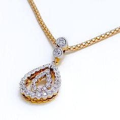 This 18k yellow gold pendant set, weighing 8.3 grams, features a dainty open drop design adorned with 1.14 carats of round brilliant cut diamonds. The diamonds, with an F-G color and VS clarity, add exceptional brilliance and elegance. The pendant measures 1 inch in length, while the matching earrings are 1.1 inches long and come with secure screw back posts. Ideal for those who appreciate luxurious and sophisticated jewelry, this set adds a touch of refined charm to any collection. Its exquisit Exquisite Teardrop Diamond Necklace, Yellow Gold Pear-shaped Diamond Necklace With Single Cut Diamonds, Gold Diamond Cut Teardrop Pendant Necklace, Hallmarked Diamond Pendant Necklace, Gold Pear-shaped Diamond Necklace With Single Cut Diamonds, Yellow Gold Diamond Necklace With Teardrop Pendant, Yellow Gold Diamond Drop Necklace With Single Cut Diamonds, Yellow Gold Teardrop Diamond Necklace With Accents, Yellow Gold Diamond Necklace With Pear-shaped Accents