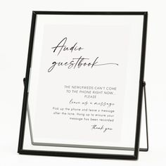 a black and white photo frame with an inscription on it