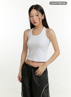 Product Detail Style : Street, Athleisure Detail : Cut out, Strap Print : Solid Material : Cotton Sleeve : Tank top Neck : Halter neck Length : Crop Cotton100 Color : Black, Light beige Model Size Model is wearing size S/M and the color Black. Height : 5'5" | 166cm / Top : S / Bottom : S (25 inch) .prddescription table, .prddescription td, .prddescription th { border : 1px solid black; border-collapse : collapse; padding: 10px; } Size(Inch) Size Shoulder Bust Armhole Hem Total Length S/M 6.3" 24 Summer Racerback Crop Top Sportswear, Summer Sportswear Racerback Crop Top, Casual White Racerback Top, Basic Racerback Top For Streetwear, Casual Moisture-wicking Racerback Crop Top, Casual Sleeveless Crop Top For Sports, White Casual Crop Top Activewear, Casual Sleeveless Sports Crop Top, Casual White Crop Top Activewear