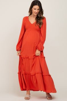 A comfortable & casual maternity dress perfect for any day!  A solid maternity midi dress with a v-neckline, smocked bodice, bubble sleeves and tiered skirt. Skirt is double lined. The Rust Smocked Tiered Maternity Midi Dress is perfectly bump-friendly! Maternity V-neck Ruched Dress, Maternity V-neck Dress With Ruched Details, V-neck Ruched Maternity Dress, Maternity Midi Dress With Smocked Back, Casual Maternity Dress With Smocked Back, Ruched V-neck Maternity Dress, Casual Maternity Dress With Smocked Bodice, Casual Ruffled Maternity Dress For Brunch, Casual Maternity Dress With Ruffles For Brunch