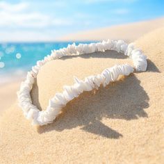 Classic white puka shell chips necklace. Necklace is 40cms long but can be extended another 5 cms. 🌊 🏊✅ Pool & ocean proof.  📦✅ Shipped FREE in the UK and dispatched on the SAME DAY where possible. 🎁✅ Gift wrap option available.  Visit our Etsy site to view other Ben's Beach jewellery --> https://www.etsy.com/uk/shop/BensBeach 🌐 Visit our main site --> https://bensbeach.com/ to view our wider selection and subscribe for updates (we do not spam) re new jewellery and offers. Follow Ben on Ins