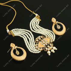 This is a stunning handmade necklace perfect for high end Jewelry Collector, a keeper in Traditional Vintage Indian/Pakistani Bridal jewelry and a Luxury Gift for your Daughter, Sister or Wife on Wedding or Anniversary. Perfect for any type of occasions, weddings And celebrations and a beautiful & memorable gift for weddings and special occasions. Description  Item Code:- L Gold Plated Peach Meenakari Chik Necklace Set Necklace Measures- Adjustable with a Dori/Cord Earring Measures- 52x40mm approx Quantity- One Necklace Set Please see more different designs here:- https://www.etsy.com/in-en/shop/LUCKYJEWELSART?ref=seller-platform-mcnav I make every item of my collection with a lot of love and care, I pay attention to every detail.  You are more than welcome to contact me for any question y Luxury Gold Plated Kundan Necklace, Luxury Meenakari Designer Necklaces, Luxury White Meenakari Necklace, Luxury Gold-plated Kundan Necklace Gift, Layer Pearl Necklace, Traditional Wedding Jewellery, Pakistani Bridal Jewelry, Layered Pearl Necklace, Necklace Trendy